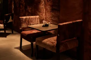 Uma área de estar no lounge · Rodeio Iguatemi